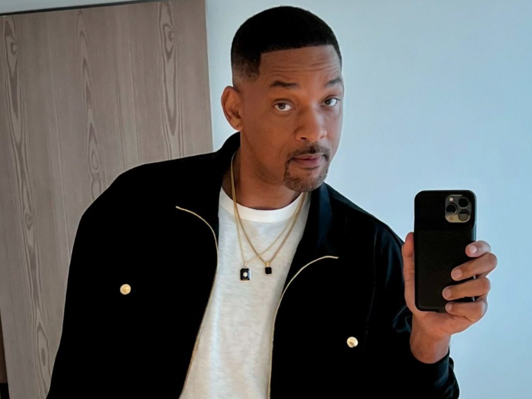 Will Smith holding phone Instagram screenshot
