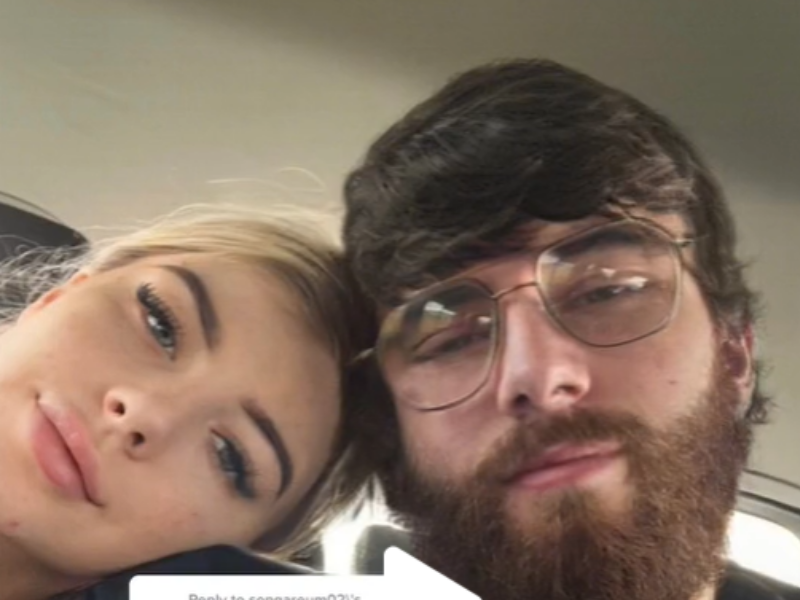 Woman and man posing together