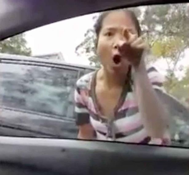 woman bangs on window