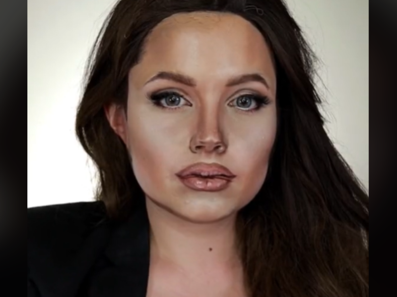 Woman does her makeup to look like Angelina Jolie
