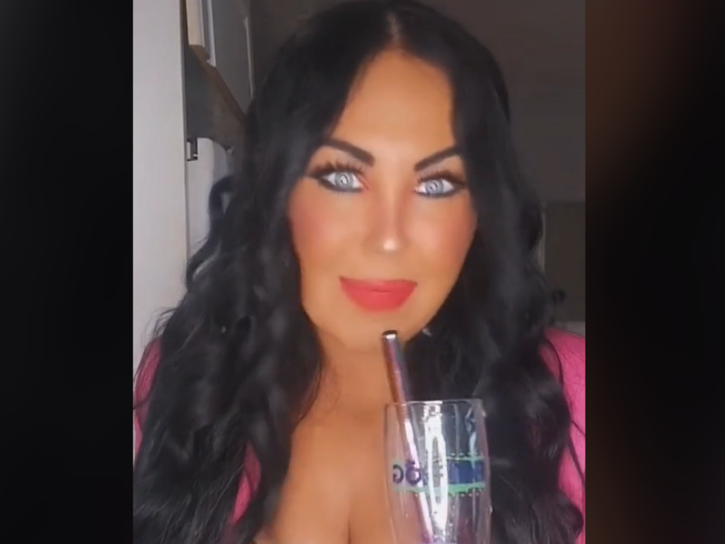 Woman drinking a cocktail