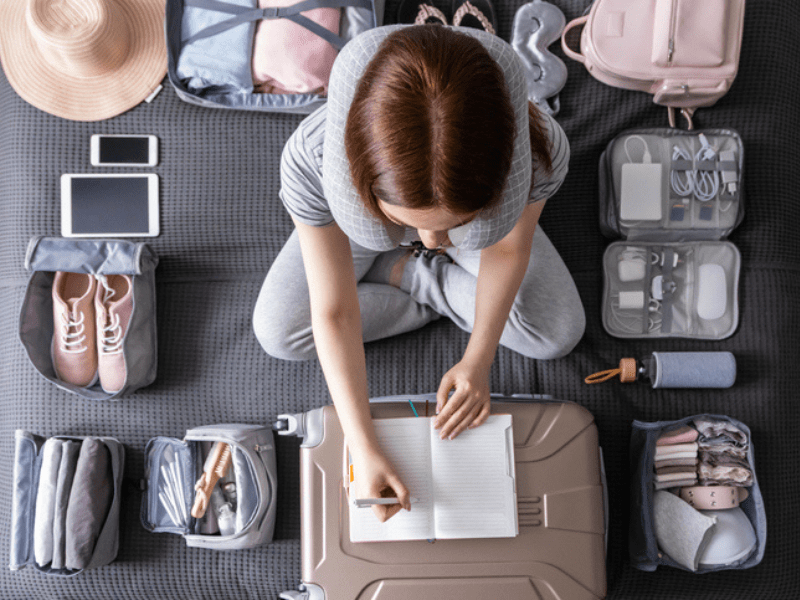 Woman packing a suitcase