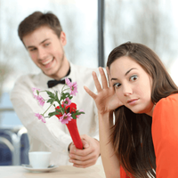 Woman rejecting man on a date couple