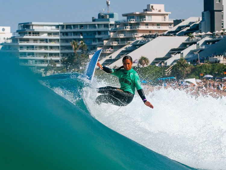 Woman surfing at Ballito pro
