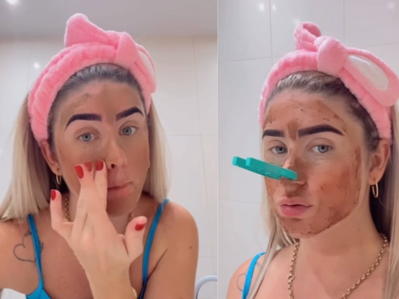 Woman with a pink headband applying a face mask