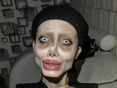 PICS: Iranian woman obsessed with looking like Angelina Jolie gets jailed!