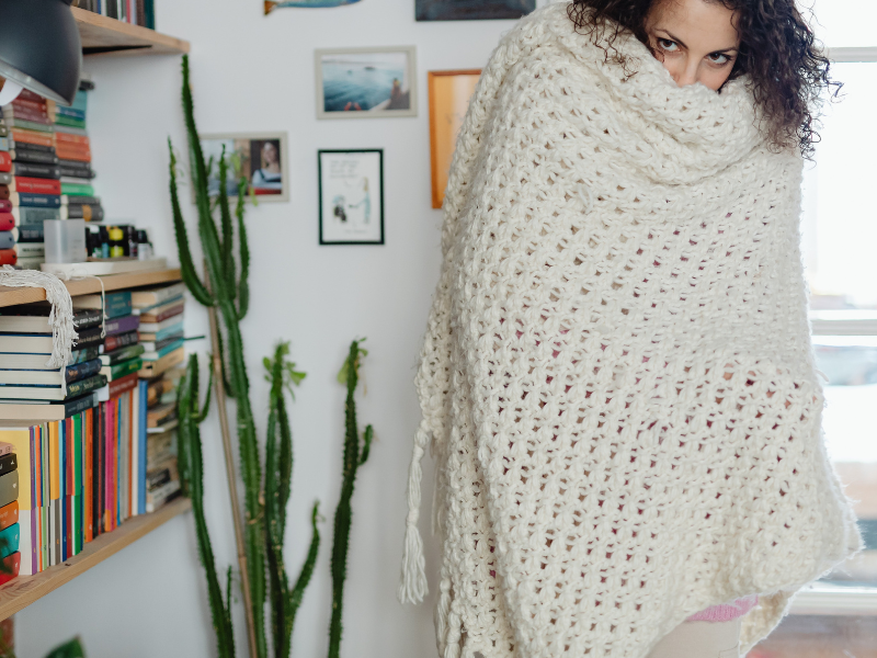 Woman with shawl wrapped around her body