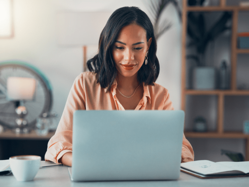 Corporate woman working on a laptop