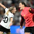 Germany's midfielder Elisa Sens and Germany's midfielder Giovanna Hoffmann celebrate after winning the UEFA Women's Euro 2025 quarter finals
