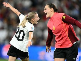 Germany's midfielder Elisa Sens and Germany's midfielder Giovanna Hoffmann celebrate after winning the UEFA Women's Euro 2025 quarter finals