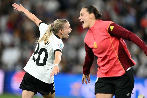 Germany's midfielder Elisa Sens and Germany's midfielder Giovanna Hoffmann celebrate after winning the UEFA Women's Euro 2025 quarter finals