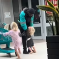 YOUNG BOY HUGGING CHECKERS DRIVER
