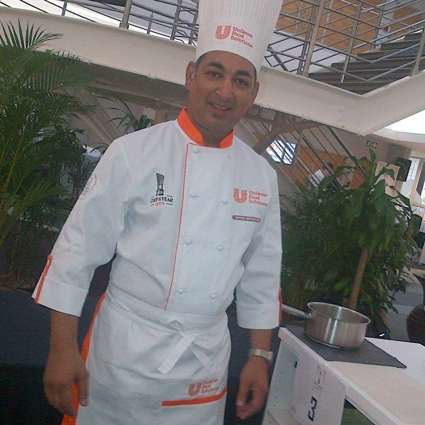 Chef Yatish Bipulprasad posed in his chef uniform at Unilever