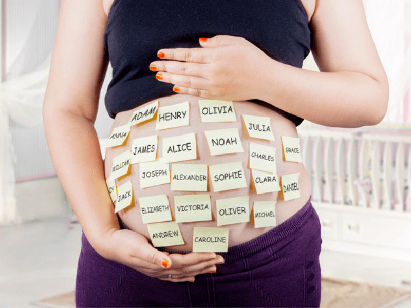 pregnant belly with baby names choices