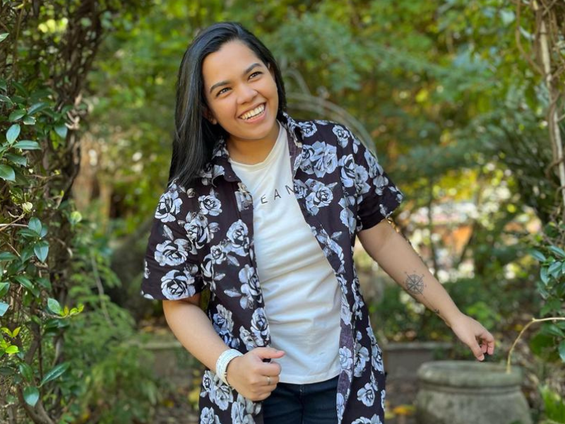 Young Indian female posing in a garden from LGBTQI+ community