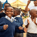 Young school kids at the Season of Sharing hamper delivery in 2024