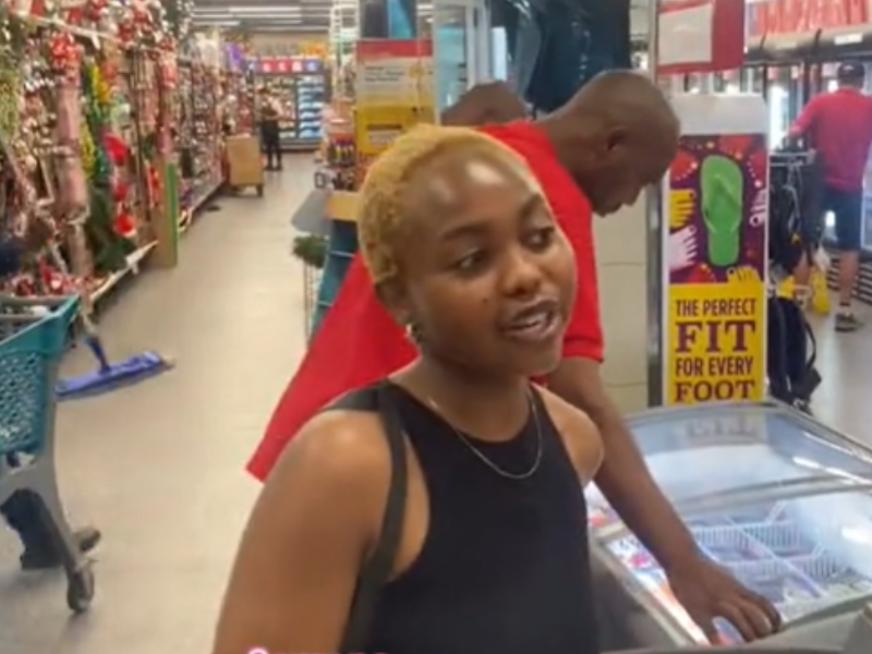 Young woman standing at Checkers tillpoint