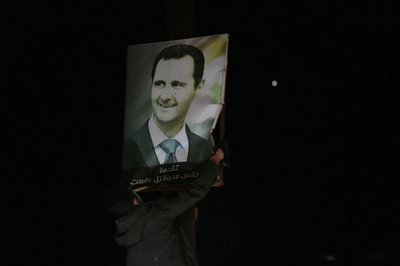 Syrians search for loved ones, rejoice in Assad's fall