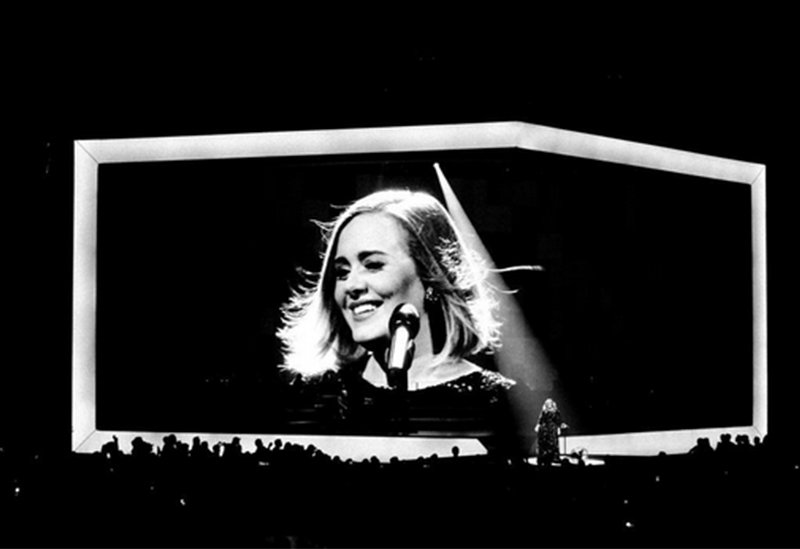 Adele calls fan on stage