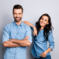 adult brother and sister wearing matching denim