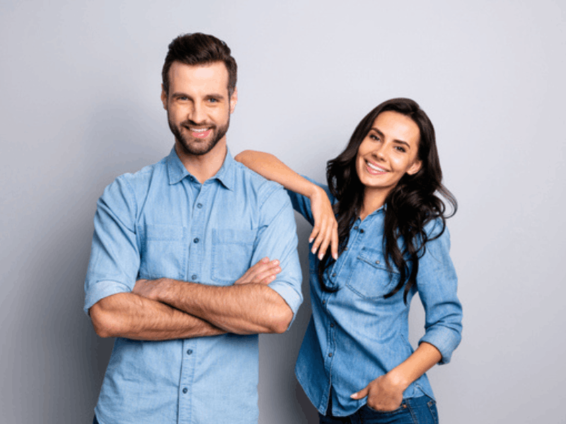 adult brother and sister wearing matching denim