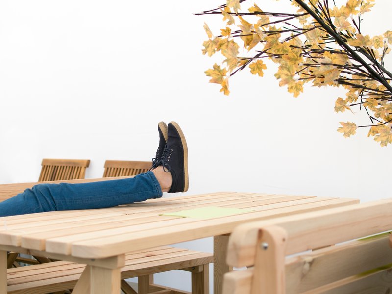 Is this normal behaviour or should people put their bare feet on furniture in public?