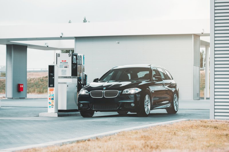 car at filling station