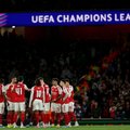 Arsenal players celebrate a goal in Champions League