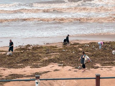 South coast community clean up after storms