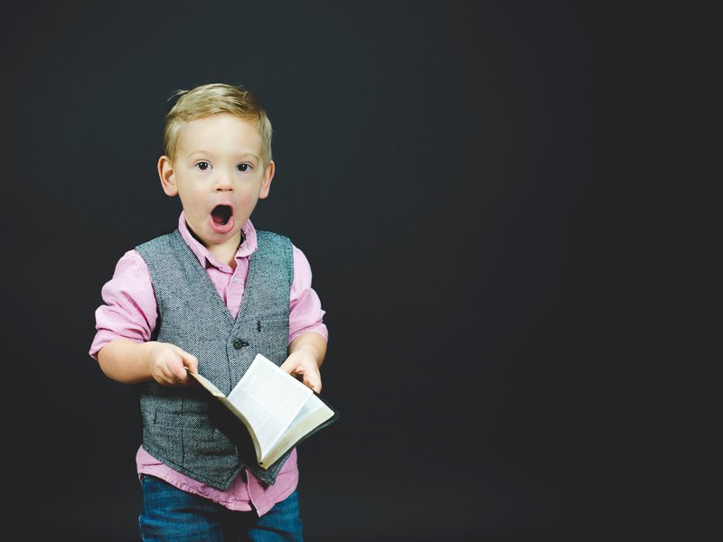 boy reading a book