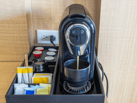 Black coffee in a hotel room