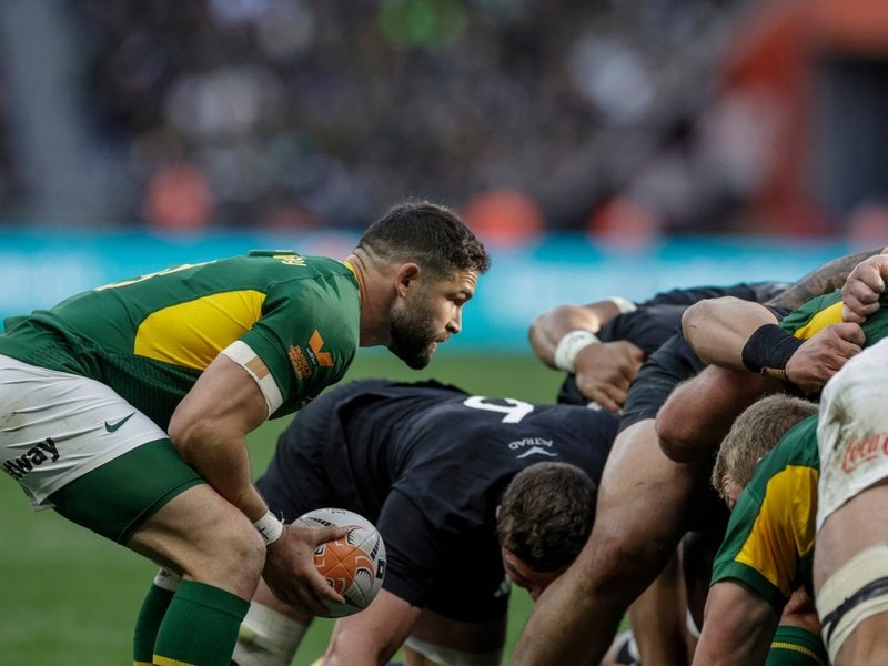 Springbok scrum-half Cobus Reinach feeds the ball against All Blacks