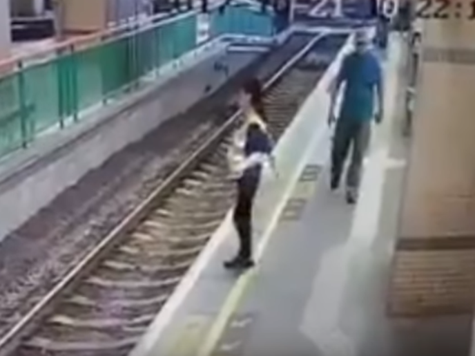 cleaner on train tracks