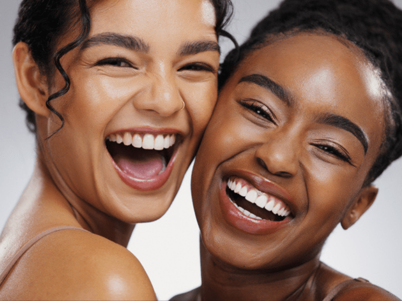 Portrait of two women smiling