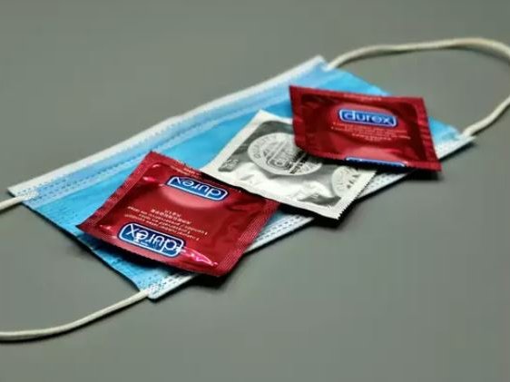 A pictire of condoms and a mask