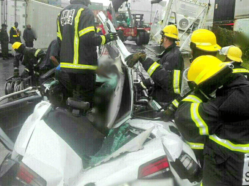 Durban Storm - Container collapses on car in Bayhead