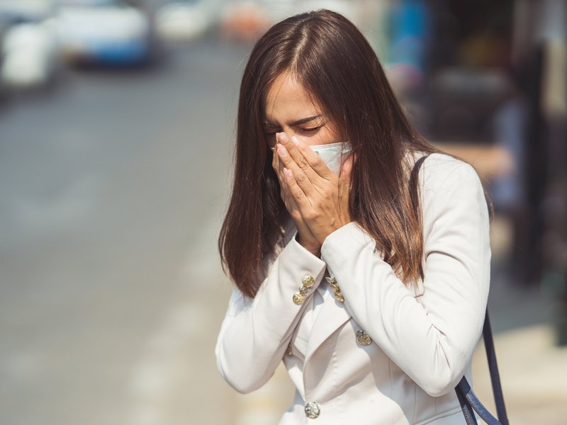 Woman coughing