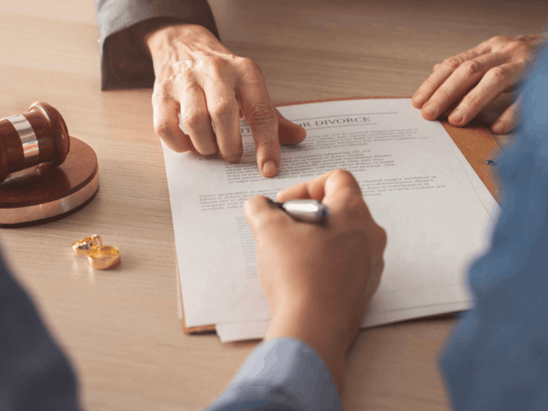 Hand signing divorce decree form