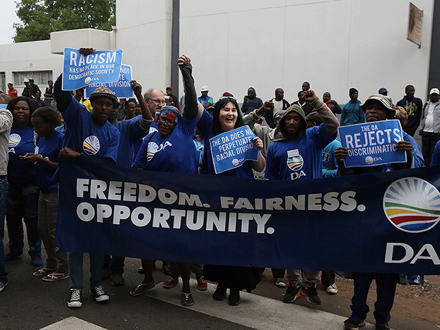 Democratic Alliance members protest outside court during coffin assault case