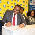 Cyril Xaba signs the MILE MOU