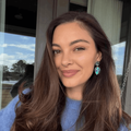 Demi-Leigh Tebow takes an outdoor selfie in a blue jersey