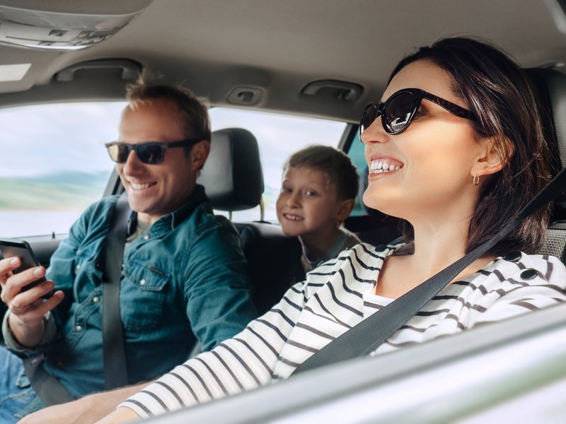 Family driving in a car