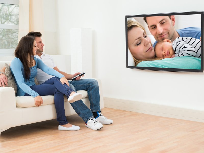 Family watching TV