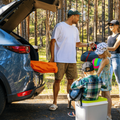 family with kids go camping