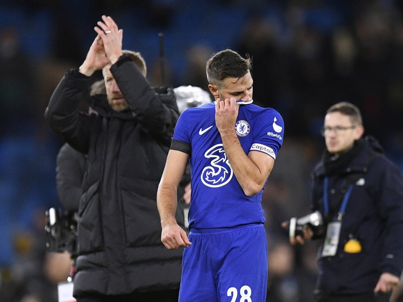 Chelsea's Spanish defender Cesar Azpilicueta (C) reacts to their defeat after the English FA Cup third round football match between Manchester City and Chelsea