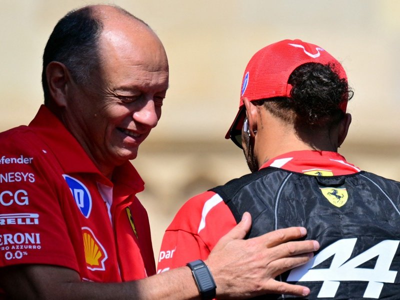 Ferrari Formula One team boss Fred Vasseur and Lewis Hamilton