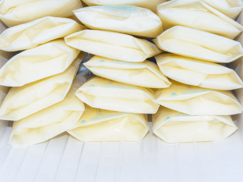frozen breast milk in clear bags-min.png