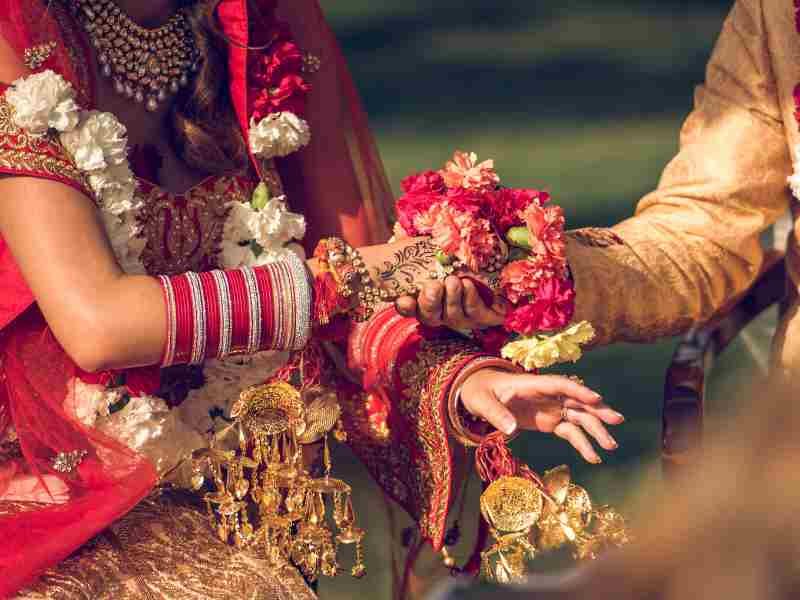 Hand in marriage Indian couple