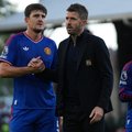Manchester United defender Harry Maguire and coach Michael Carrick