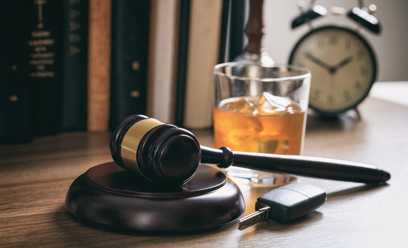 Law gavel, alcohol and car keys / iStock